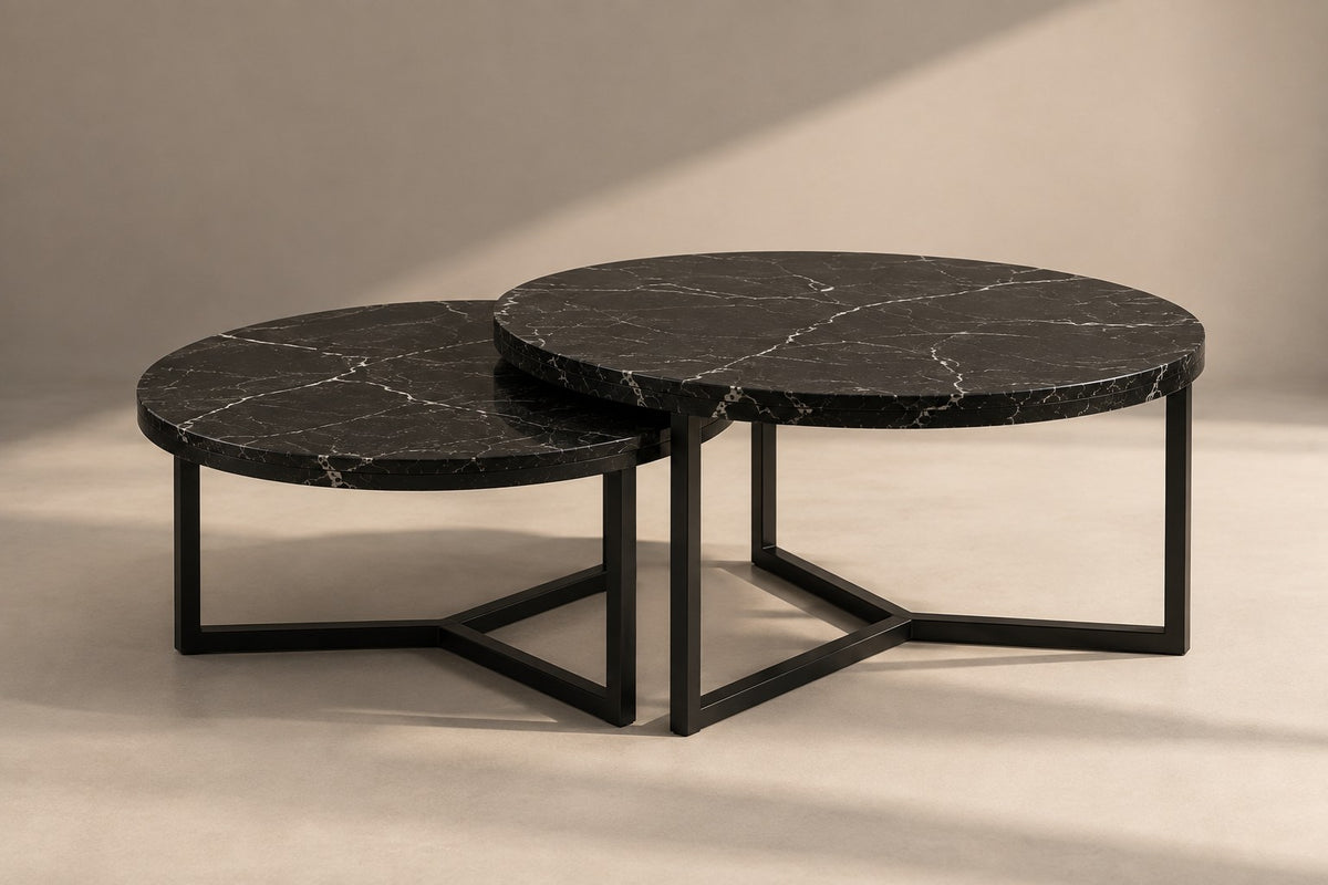 Oda nesting table set in Nero: two round tables on a black three-point frame